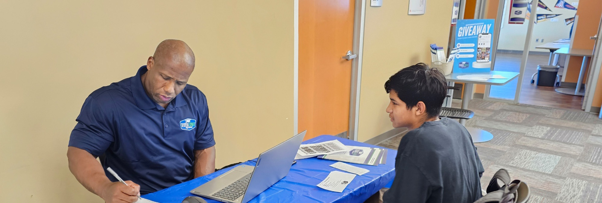 Counselor talking to a student